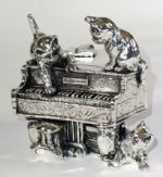 Cats, ï¿½The piano playersï¿½